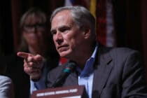 Texas governor Greg Abbott pointing an angry finger