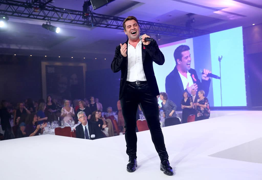 Joe McElderry performs at the Breast Cancer Care London Fashion Show in association with Dorothy Perkins at Park Plaza Westminster Bridge Hotel on October 4, 2018 in London, England. 