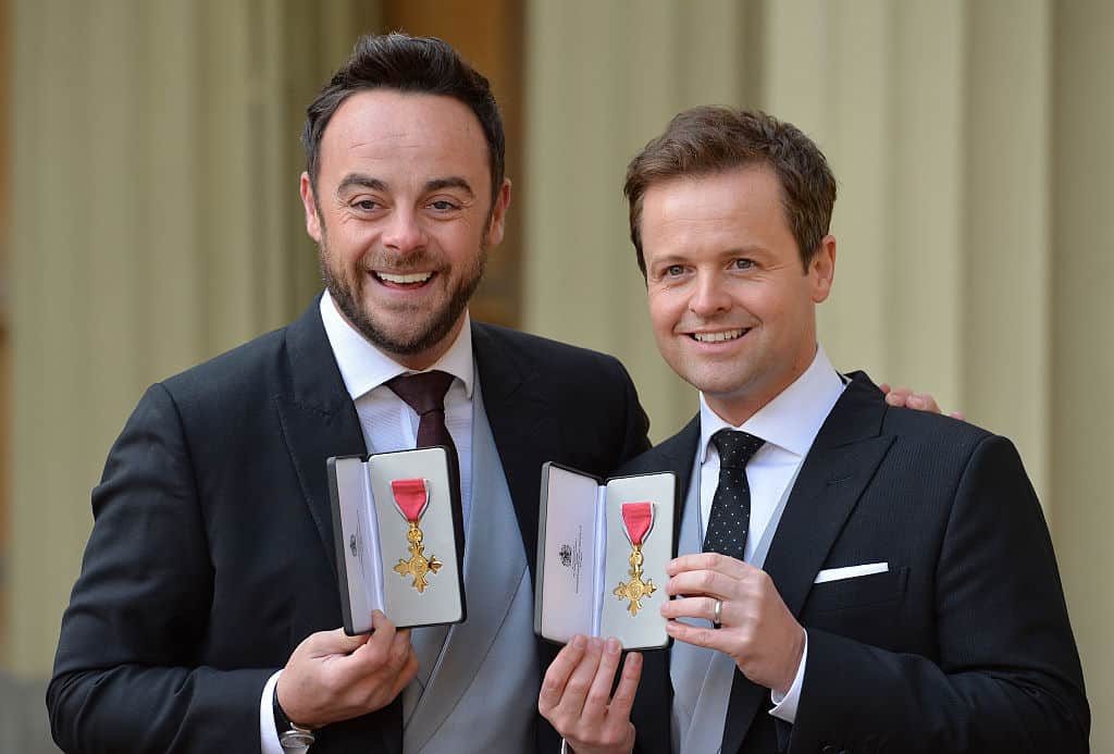 TV presenters Ant and Dec pose with theirs OBEs. 