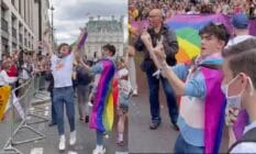 Joe Locke and Sebastian Croft, who are stars of the hit series Heartstopper, wear Pride flags as they dance around and wave the middle finger at a crowd of anti-LGBTQ+ protestors at Pride in London
