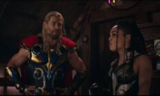 A still taken from Thor: Love and Thunder which sees Thor (Chris Hemsworth) dressed in gold plated armour and a red cape interacting with Valkyrie (Tessa Thompson) who is dressed in armour as well