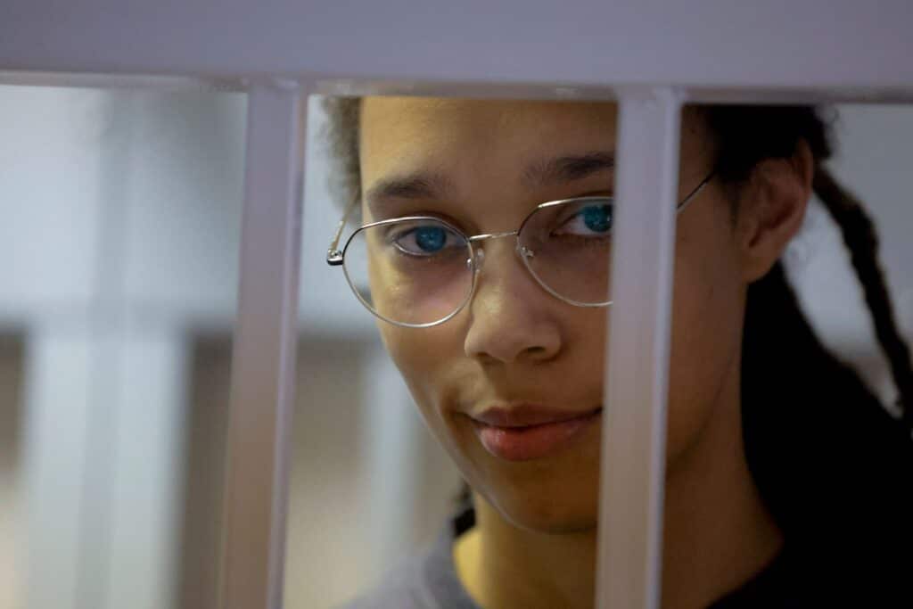 Brittney Griner looks out of a jail cell